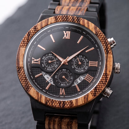 Men's zebrawood and ebony wood chronograph wristwatch close-up, black dial with Roman numerals, Overpowered Accessories