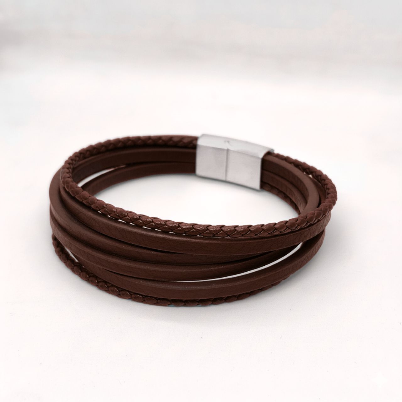 Brown leather multi-wrap bracelet with silver square clasp and braided top strip