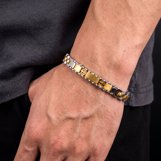 Men's two-tone stainless steel bracelet, alternating silver and gold links on wrist