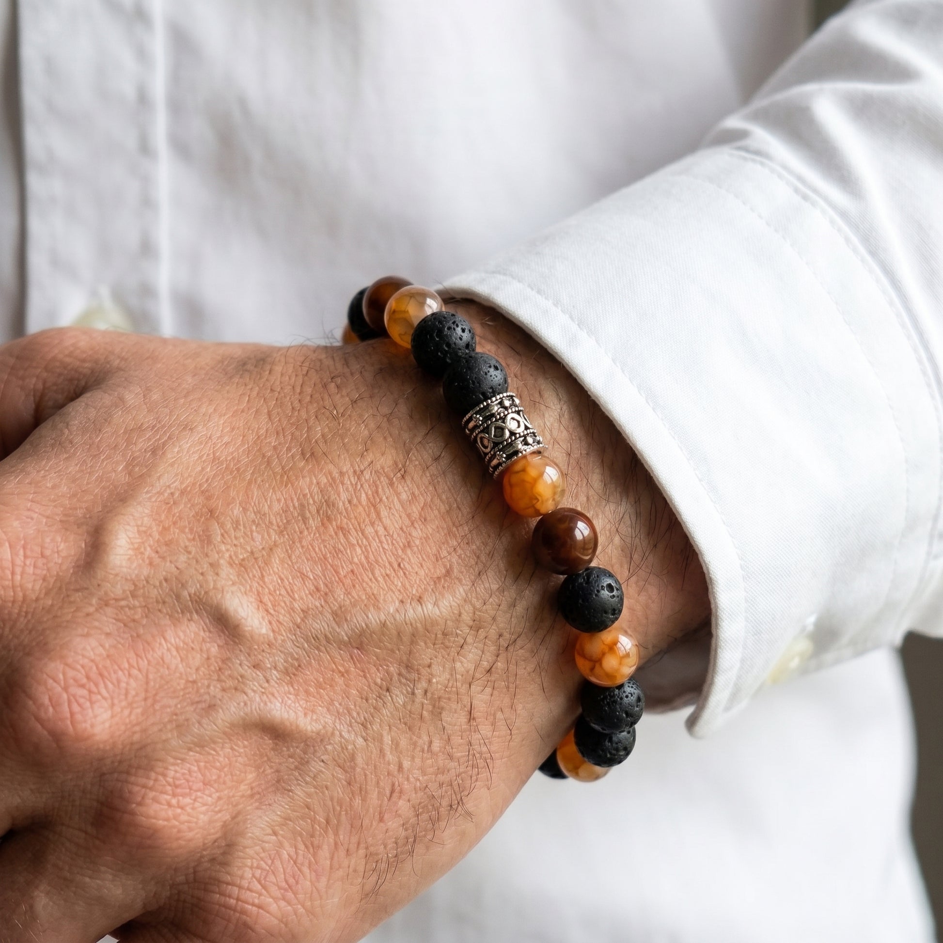 Natural Agate & Lava G-19 Stone Bracelet for men featuring black lava and orange agate beads with a decorative silver spacer.