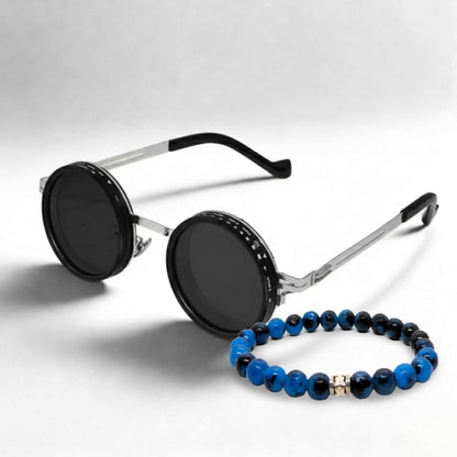 Men's blue beaded bracelet and black round sunglasses with metal arms.