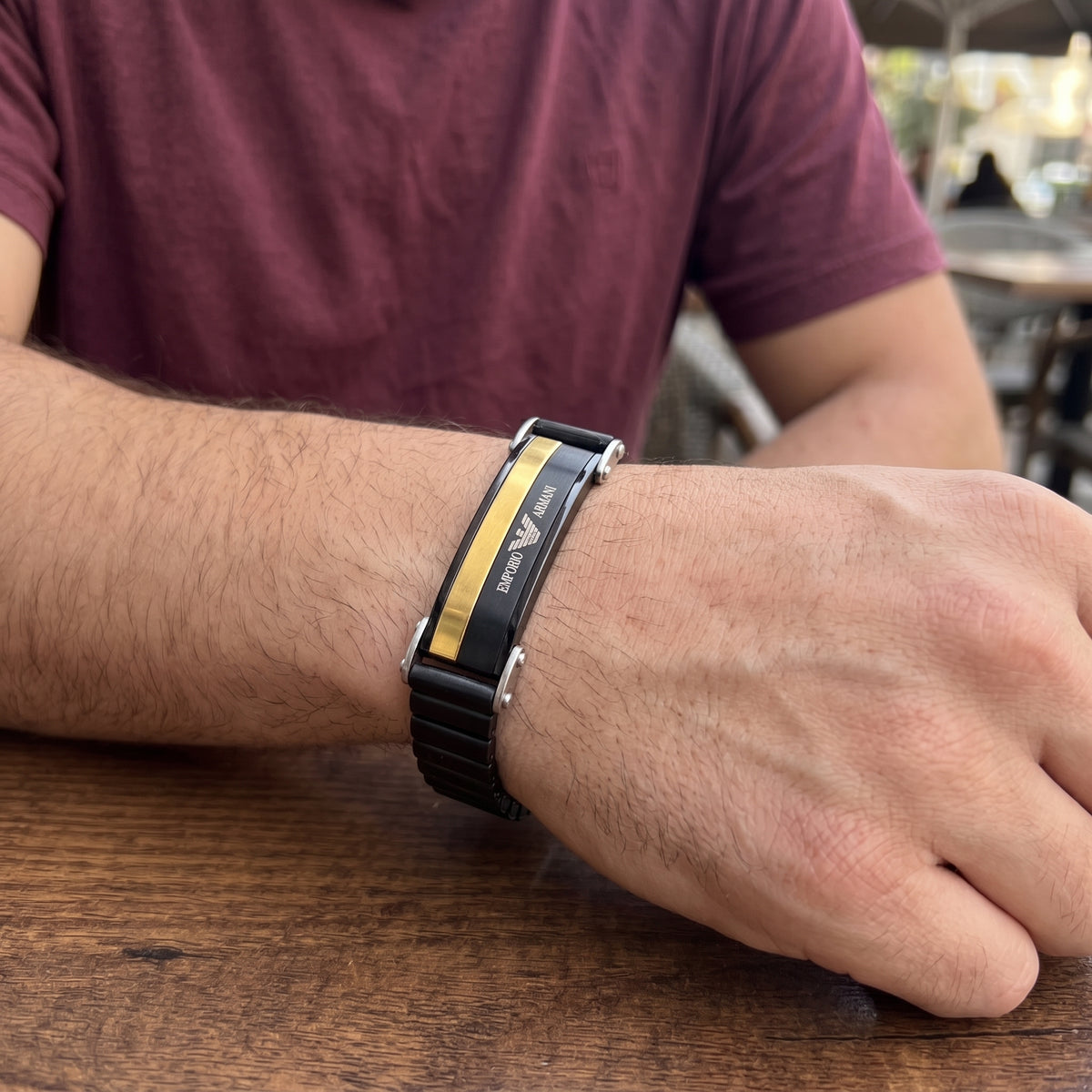 Men's black stainless ID bracelet with gold stripe and watch-style clasp