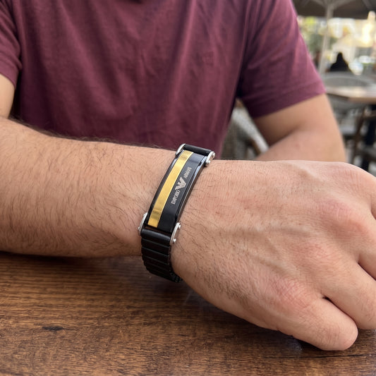 Men's black stainless ID bracelet with gold stripe and watch-style clasp