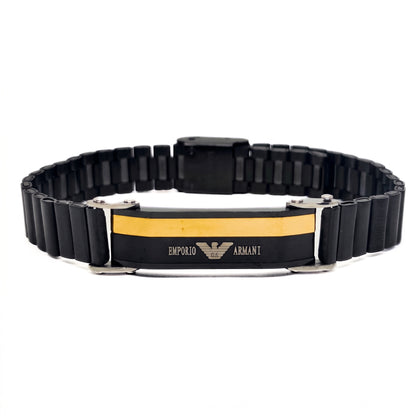 Men's black stainless ID bracelet with rectangular clasp and gold stripe logo plate