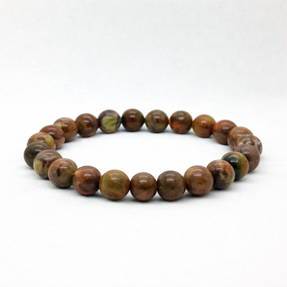 Men's Earthbound Sovereignty Bundle G-5 G-6 stone bracelet by Overpowered Accessories, featuring earthy-toned beads on a whit