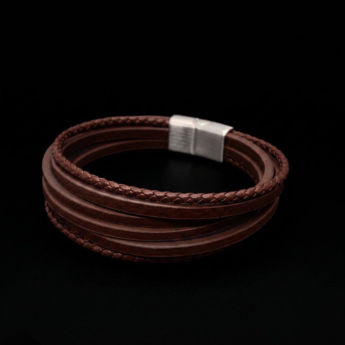 Brown leather wrap bracelet with braided rows and silver clasp