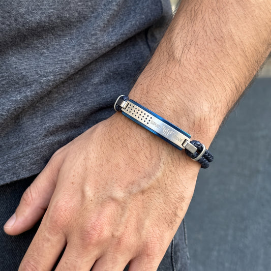 Men's braided leather bracelet with blue metal bar and silver accents on wrist