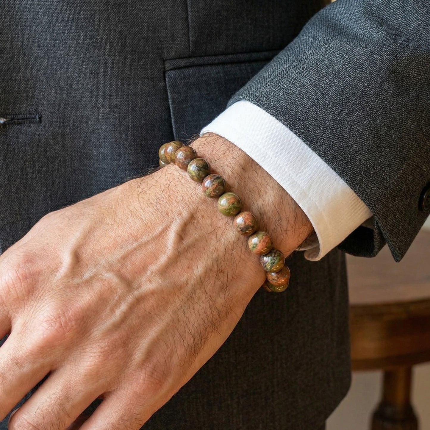 Natural Agate G-6 men's bracelet by Overpowered Accessories, featuring polished stone beads worn on a wrist.