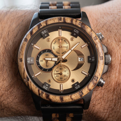 Men's wooden wristwatch close-up, cream dial, dark bezel, zebrawood patterned case, Overpowered Accessories