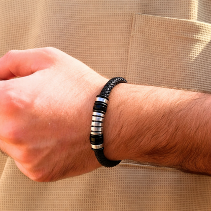 Luxury Black Leather & Silver Stainless Steel B-124 Bracelet worn on a wrist, featuring a braided design and metallic accents