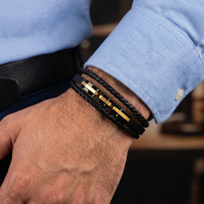 Men's black leather wrap bracelet, braided straps with gold-tone center bars