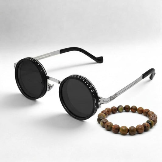 Round black sunglasses with dark lenses and beaded stone bracelet