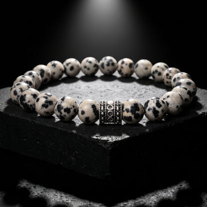 Men's jasper bead bracelet with round speckled stones and a silver-tone spacer centerpiece